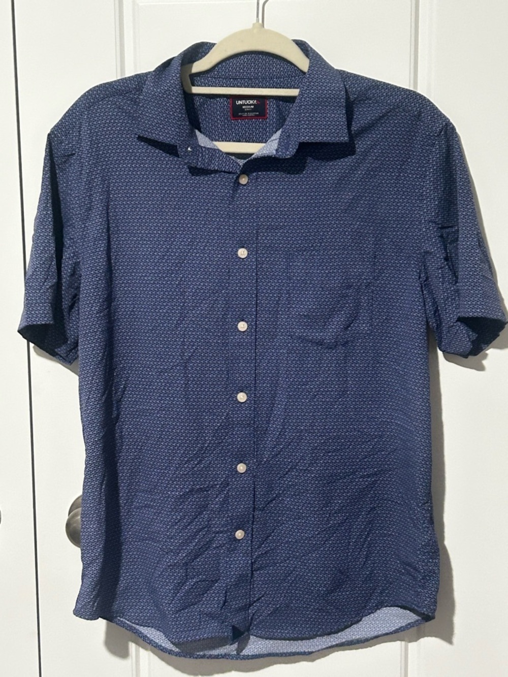 Untuckit Men's Style Name- Murphy-Perf-SS MEDIUM. SLIM FIT. 
Color: Blue
